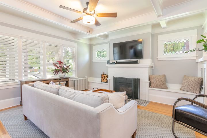 Bright furnished living room photographed for a home listing
