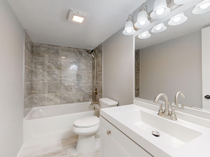 Bright residential bathroom photographed for a home listing