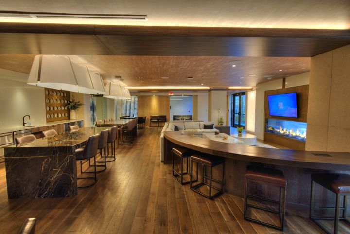 Apartment resident lounge and bar photographed for leasing marketing